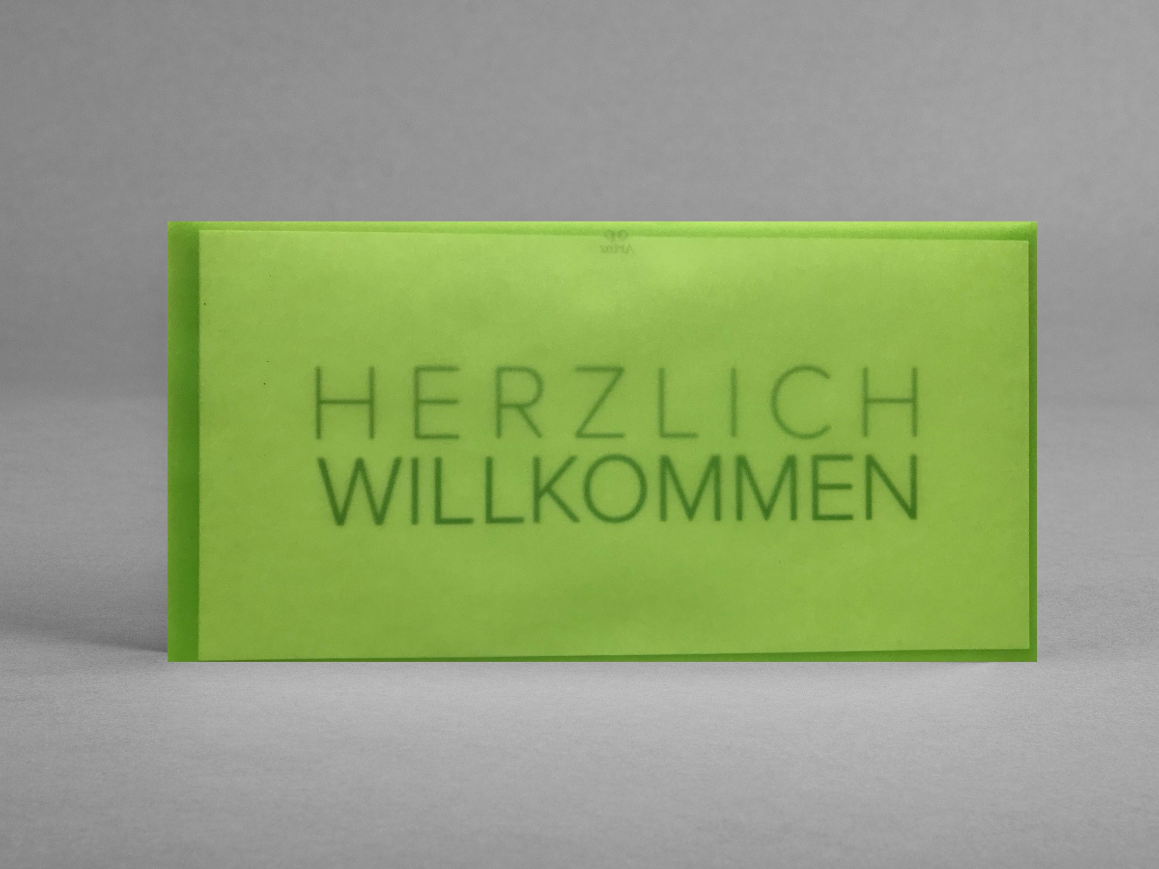 Grusskarte_Herzlich-Willkommen_GuD_im-lemon-gruenen-Transparentkufert_artoz_grusskarten-designFESTNQyMgp6Cj